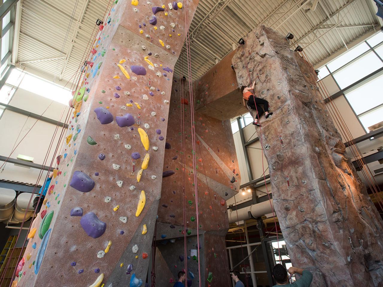 Broad view of the climbing walls at the Adventure Recreation Center