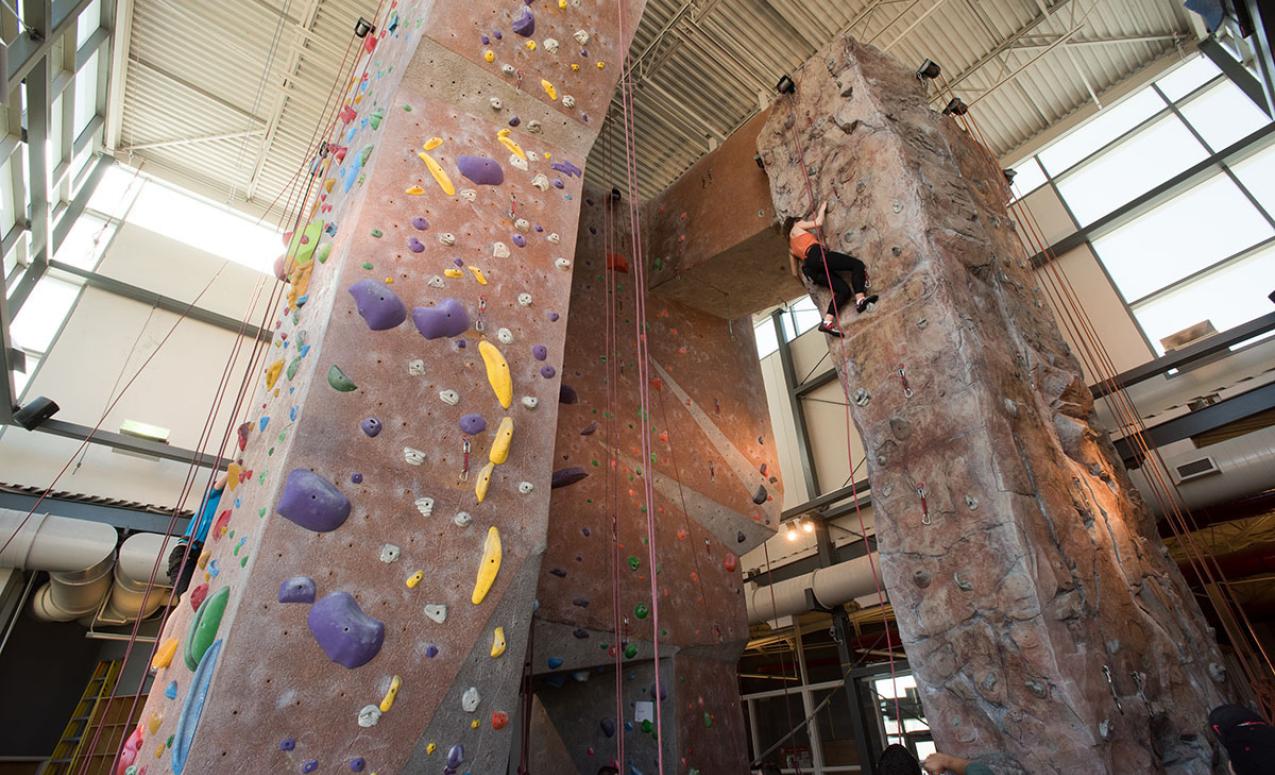 Broad view of the climbing walls at the Adventure Recreation Center