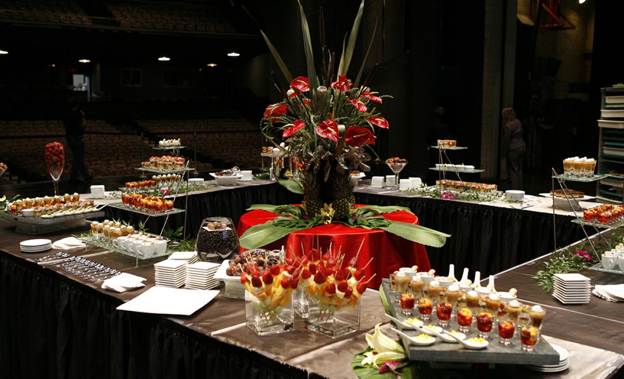 Image of centerpiece and desserts provided by University catering